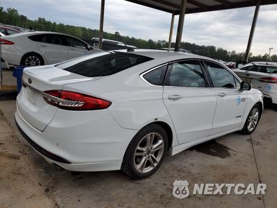 Trzecie zdjęcie samochodu z tyłu: 2018 FORD FUSION SE HYBRID VIN:3FA6P0LU4JR163536 - miniatura