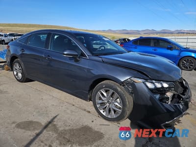 Czwarte zdjęcie samochodu z boku: 2022 TOYOTA AVALON XLE VIN:4T1JZ1FB4NU082917 - miniatura