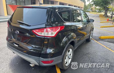 Czwarte zdjęcie samochodu z boku: 2014 FORD ESCAPE SE VIN:1FMCU0GX0EUC69759 - miniatura