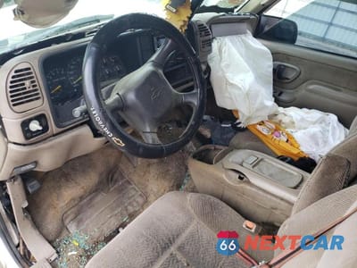 Zdjęcie 8 z 13 samochodu: 1999 CHEVROLET TAHOE K1500 VIN:1GNEK13R8XJ398392 - miniatura
