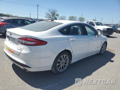 Trzecie zdjęcie samochodu z tyłu: 2017 FORD FUSION SE HYBRID VIN:3FA6P0LU2HR409090 - miniatura