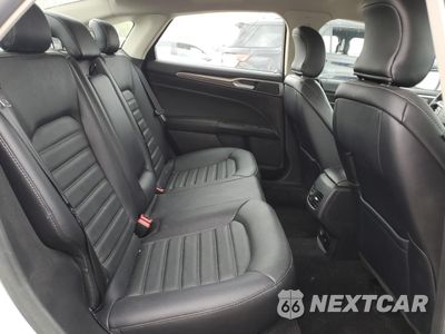 Zdjęcie 10 z 13 samochodu: 2018 FORD FUSION SE HYBRID VIN:3FA6P0LU1JR172033 - miniatura