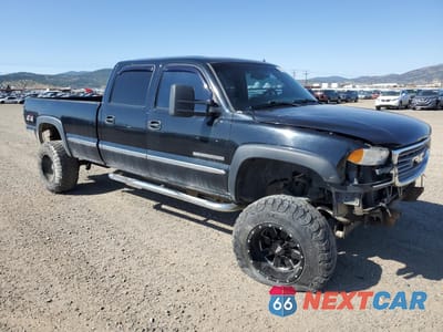 Czwarte zdjęcie samochodu z boku: 2002 GMC SIERRA K2500 HEAVY DUTY VIN:1GTHK23G02F154631 - miniatura