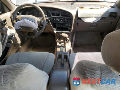 Zdjęcie 8 z 14 samochodu: 1995 TOYOTA CAMRY LE VIN:4T1SK12E1SU492613 - miniatura