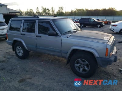 Czwarte zdjęcie samochodu z boku: 2000 JEEP CHEROKEE SPORT VIN:1J4FF48S5YL273686 - miniatura