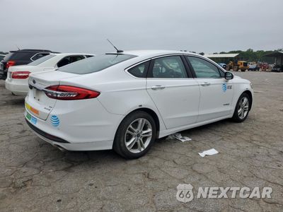 Trzecie zdjęcie samochodu z tyłu: 2018 FORD FUSION SE HYBRID VIN:3FA6P0LU6JR118789 - miniatura