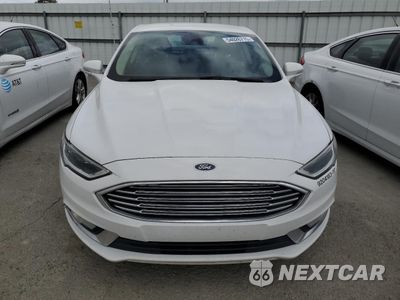 Piąte zdjęcie samochodu w środku: 2017 FORD FUSION SE HYBRID VIN:3FA6P0LU2HR409364 - miniatura