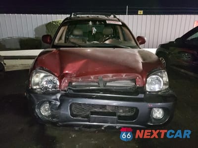 Piąte zdjęcie samochodu w środku: 2004 HYUNDAI SANTA FE GLS VIN:KM8SC13D74U847113 - miniatura