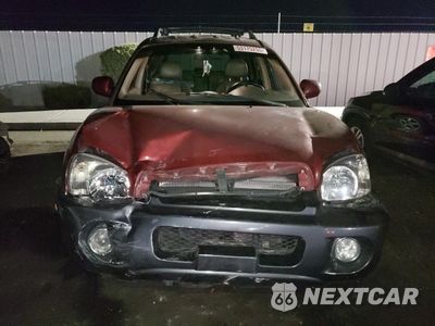 Piąte zdjęcie samochodu w środku: 2004 HYUNDAI SANTA FE GLS VIN:KM8SC13D74U847113 - miniatura