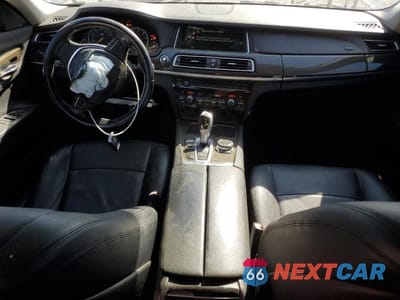 Zdjęcie 8 z 13 samochodu: 2014 BMW 740 I VIN:WBAYA6C58ED144242 - miniatura