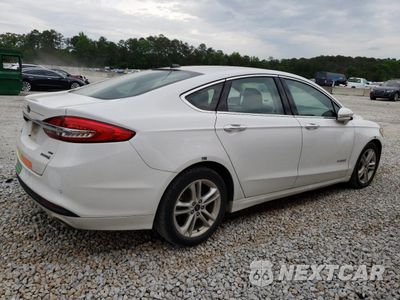Trzecie zdjęcie samochodu z tyłu: 2018 FORD FUSION SE HYBRID VIN:3FA6P0LU9JR171759 - miniatura
