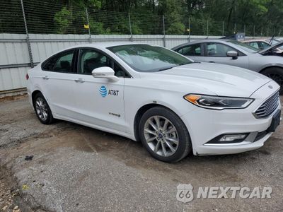 Czwarte zdjęcie samochodu z boku: 2017 FORD FUSION SE HYBRID VIN:3FA6P0LU5HR409617 - miniatura