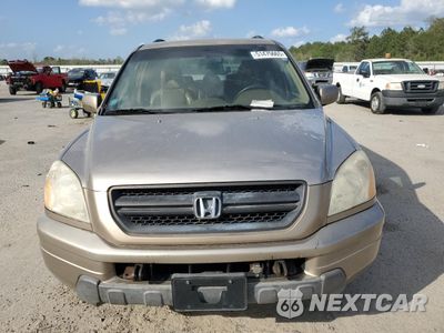 Piąte zdjęcie samochodu w środku: 2004 HONDA PILOT EXL VIN:2HKYF187X4H552431 - miniatura