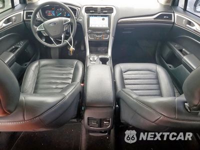 Zdjęcie 8 z 12 samochodu: 2017 FORD FUSION SE HYBRID VIN:3FA6P0LUXHR409502 - miniatura