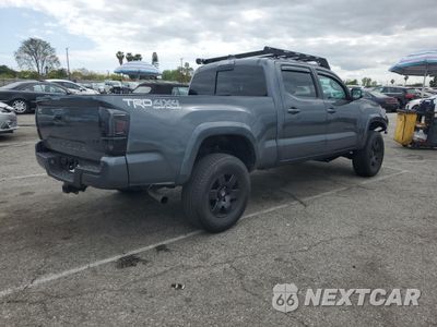 Trzecie zdjęcie samochodu z tyłu: 2020 TOYOTA TACOMA DOUBLE CAB VIN:3TMDZ5BN0LM097005 - miniatura