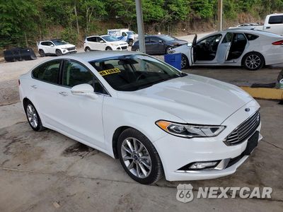 Czwarte zdjęcie samochodu z boku: 2017 FORD FUSION SE HYBRID VIN:3FA6P0LU2HR409476 - miniatura