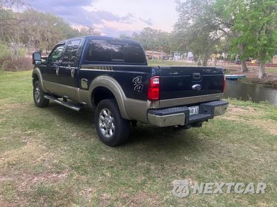 Czwarte zdjęcie samochodu z boku: 2014 FORD F350 SUPER DUTY VIN:1FT8W3B65EEB23064 - miniatura