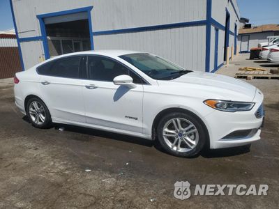 Czwarte zdjęcie samochodu z boku: 2018 FORD FUSION SE HYBRID VIN:3FA6P0LU6JR171590 - miniatura