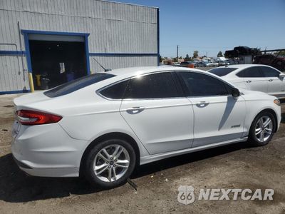 Trzecie zdjęcie samochodu z tyłu: 2018 FORD FUSION SE HYBRID VIN:3FA6P0LU1JR278627 - miniatura