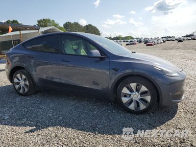 Czwarte zdjęcie samochodu z boku: 2023 TESLA MODEL Y VIN:7SAYGDEE4PA169461 - miniatura