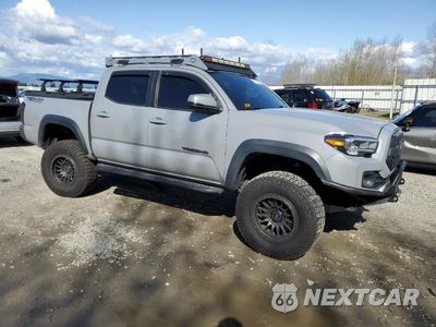 Czwarte zdjęcie samochodu z boku: 2020 TOYOTA TACOMA DOUBLE CAB VIN:3TMCZ5AN5LM346055 - miniatura
