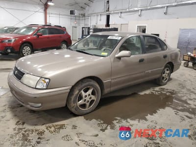 1999 TOYOTA AVALON XL 4T1BF18B0XU339942 - główne zdjęcie licytacji z USA - miniatura