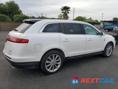 Trzecie zdjęcie samochodu z tyłu: 2011 LINCOLN MKT VIN:2LMHJ5AT1BBJ50674 - miniatura