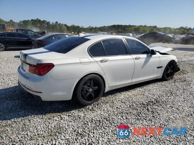 Trzecie zdjęcie samochodu z tyłu: 2014 BMW 740 I VIN:WBAYA6C58ED144242 - miniatura