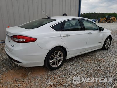 Trzecie zdjęcie samochodu z tyłu: 2018 FORD FUSION SE HYBRID VIN:3FA6P0LU7JR171758 - miniatura