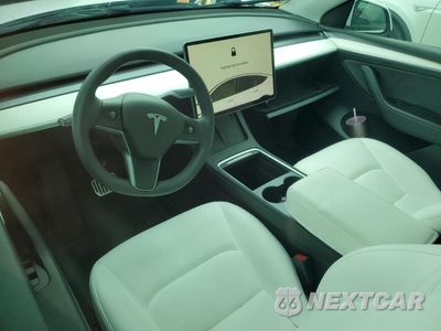 Zdjęcie 8 z 13 samochodu: 2023 TESLA MODEL Y VIN:7SAYGDEE8PF620703 - miniatura