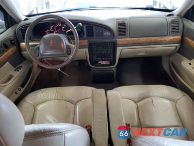 Zdjęcie 8 z 12 samochodu: 1999 LINCOLN CONTINENTAL VIN:1LNHM97V9XY667718 - miniatura