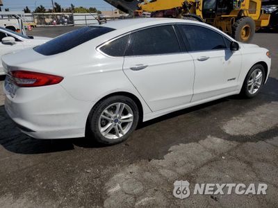 Trzecie zdjęcie samochodu z tyłu: 2018 FORD FUSION SE HYBRID VIN:3FA6P0LU9JR281873 - miniatura