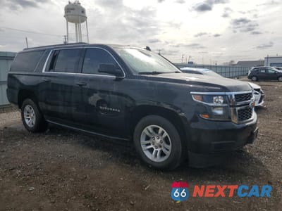 Czwarte zdjęcie samochodu z boku: 2020 CHEVROLET SUBURBAN K1500 LT VIN:1GNSKHKC5LR300228 - miniatura