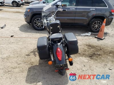 Czwarte zdjęcie samochodu z boku: 2006 HONDA VTX1300 R VIN:1HFSC52626A307032 - miniatura