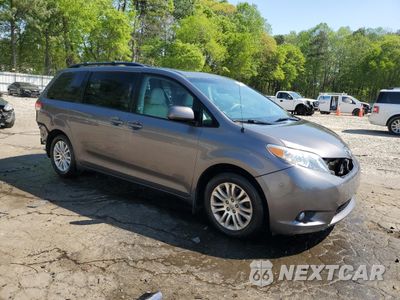 Czwarte zdjęcie samochodu z boku: 2014 TOYOTA SIENNA XLE VIN:5TDYK3DC0ES486882 - miniatura
