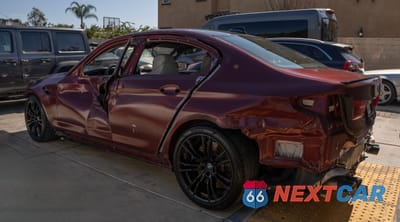 Trzecie zdjęcie samochodu z tyłu: 2018 BMW M5 VIN:WBSJF0C55JB283553 - miniatura