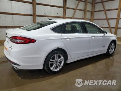 Trzecie zdjęcie samochodu z tyłu: 2018 FORD FUSION SE HYBRID VIN:3FA6P0LU3JR118801 - miniatura
