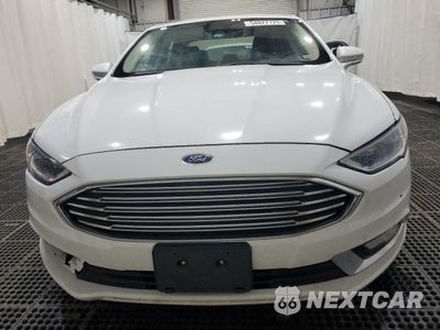 Piąte zdjęcie samochodu w środku: 2017 FORD FUSION SE HYBRID VIN:3FA6P0LUXHR409628 - miniatura