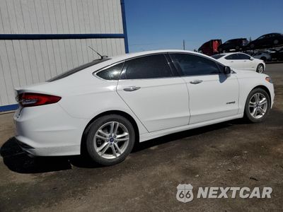 Trzecie zdjęcie samochodu z tyłu: 2018 FORD FUSION SE HYBRID VIN:3FA6P0LU0JR281874 - miniatura