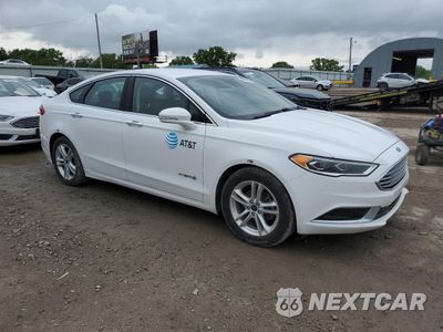 Czwarte zdjęcie samochodu z boku: 2018 FORD FUSION SE HYBRID VIN:3FA6P0LU5JR171936 - miniatura