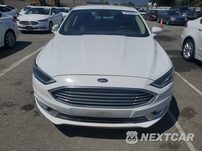 Piąte zdjęcie samochodu w środku: 2017 FORD FUSION SE HYBRID VIN:3FA6P0LU5HR409312 - miniatura