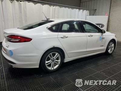 Trzecie zdjęcie samochodu z tyłu: 2018 FORD FUSION SE HYBRID VIN:3FA6P0LU6JR171850 - miniatura