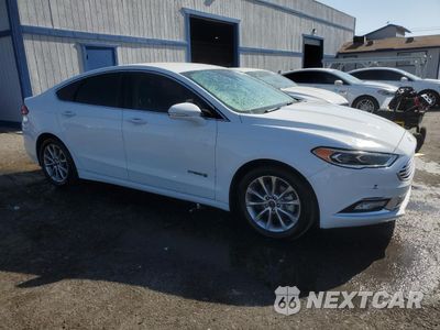 Czwarte zdjęcie samochodu z boku: 2017 FORD FUSION SE HYBRID VIN:3FA6P0LU3HR409356 - miniatura