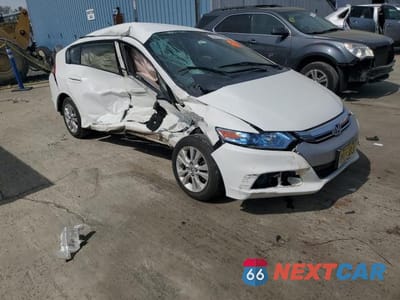 Czwarte zdjęcie samochodu z boku: 2012 HONDA INSIGHT EX VIN:JHMZE2H79CS005016 - miniatura