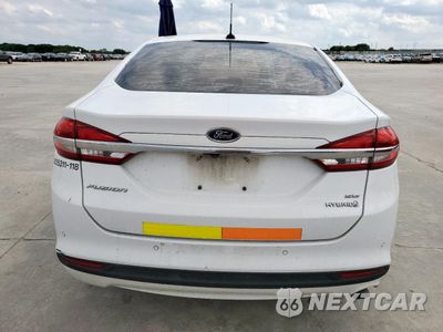 Zdjęcie 6 z 12 samochodu: 2018 FORD FUSION SE HYBRID VIN:3FA6P0LU5JR129847 - miniatura