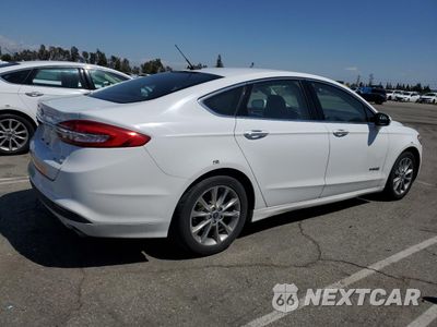 Trzecie zdjęcie samochodu z tyłu: 2017 FORD FUSION SE HYBRID VIN:3FA6P0LU6HR409335 - miniatura