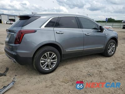 Trzecie zdjęcie samochodu z tyłu: 2021 CADILLAC XT5 PREMIUM LUXURY VIN:1GYKNCR41MZ116000 - miniatura