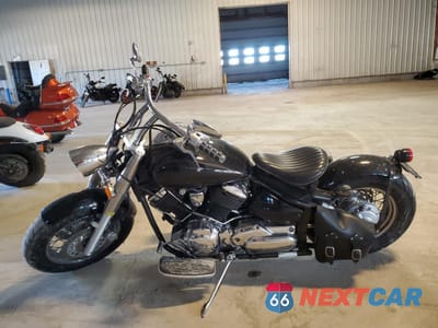 Trzecie zdjęcie samochodu z tyłu: 2003 YAMAHA XVS1100 A VIN:JYAVP11E73A042001 - miniatura