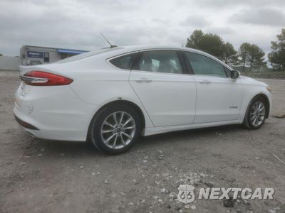 Trzecie zdjęcie samochodu z tyłu: 2017 FORD FUSION SE HYBRID VIN:3FA6P0LU9HR409118 - miniatura