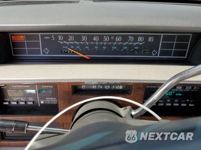 Zdjęcie 9 z 14 samochodu: 1993 CADILLAC DEVILLE VIN:1G6CD53B3P4241116 - miniatura